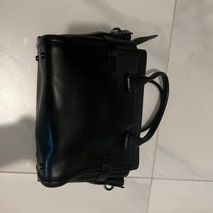 Coach black satchel, perfect size. Used, in good condition. Can send more videos